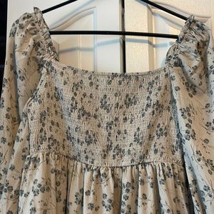 Henly brand new never been worn. Size small, knee length lined 100%polyester